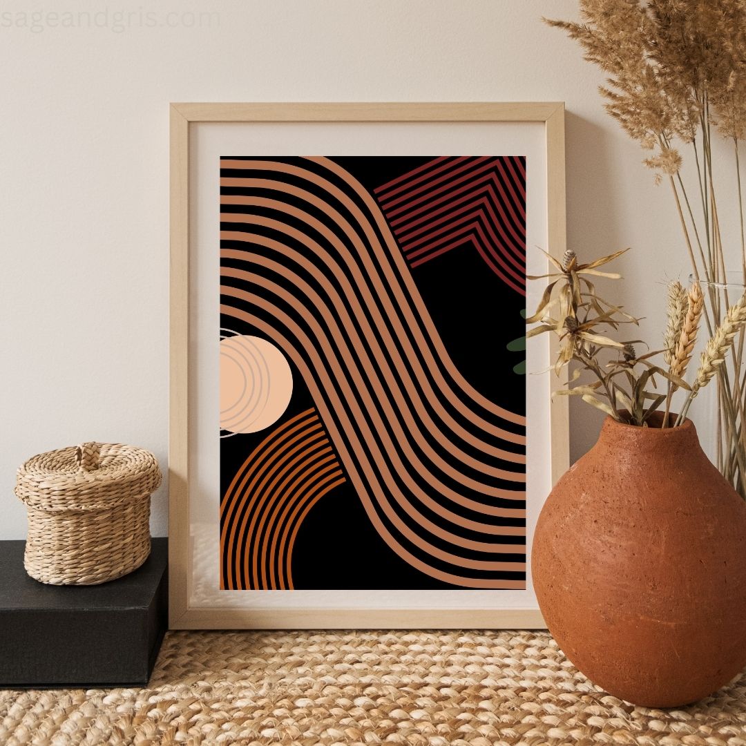Framed bohemian art print with wicker basket and terracotta vase on a textured surface